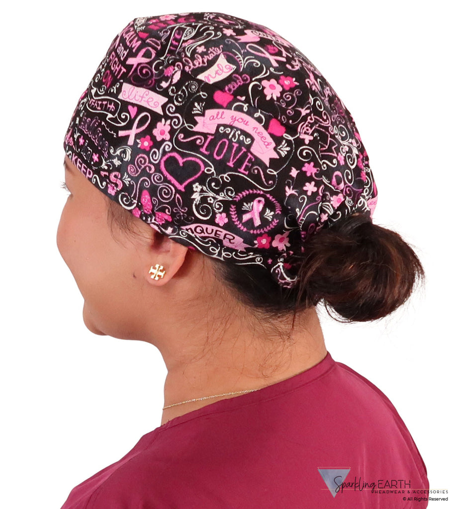 Side facing image of a woman in scrubs wearing a Classic Surgical Scrub Cap in a Pink Ribbon Collage on Black pattern.