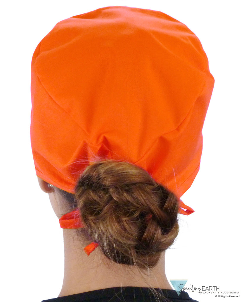 Back Facing View of a Woman Wearing a Classic Cotton Surgical Scrub Cap - Solid Orange Scrub Cap
