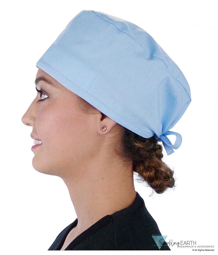 Side Facing View of a Woman Wearing a Classic Cotton Surgical Scrub Cap - Solid Sky Light Scrub Cap