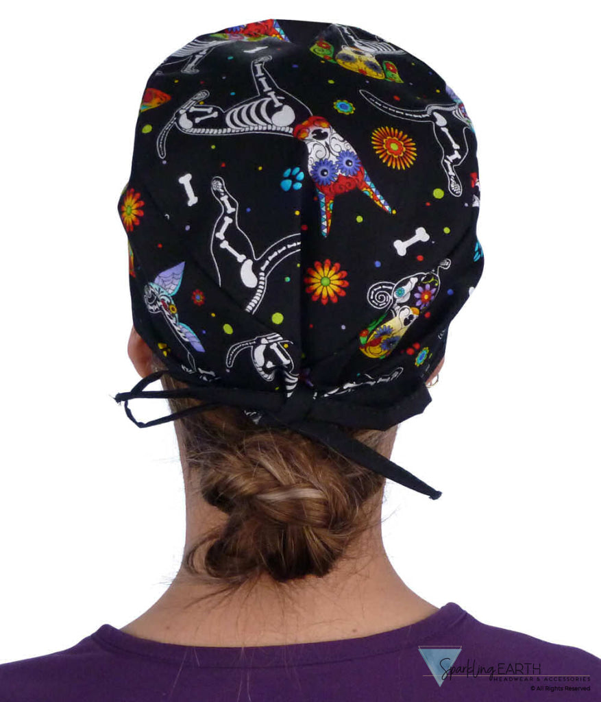 Back facing image of a woman in scrubs wearing a Classic Surgical Scrub Cap in a X Ray Dogs with black ties pattern.