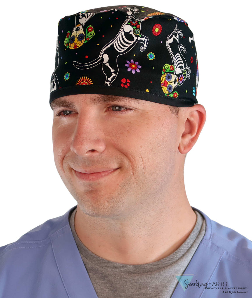 Front facing image of a man in scrubs wearing a Classic Surgical Scrub Cap in a X Ray Dogs with black ties pattern.