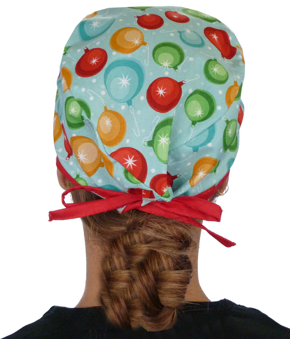 Back facing image of a woman in scrubs wearing a Classic Surgical Scrub Cap with a Christmas Ornaments with Red Ties pattern.