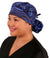 Front Facing Tied View of a Woman Wearing a Banded Bouffant Ponytail Surgical Scrub Cap - Waves of Blue Patterned Fabric 