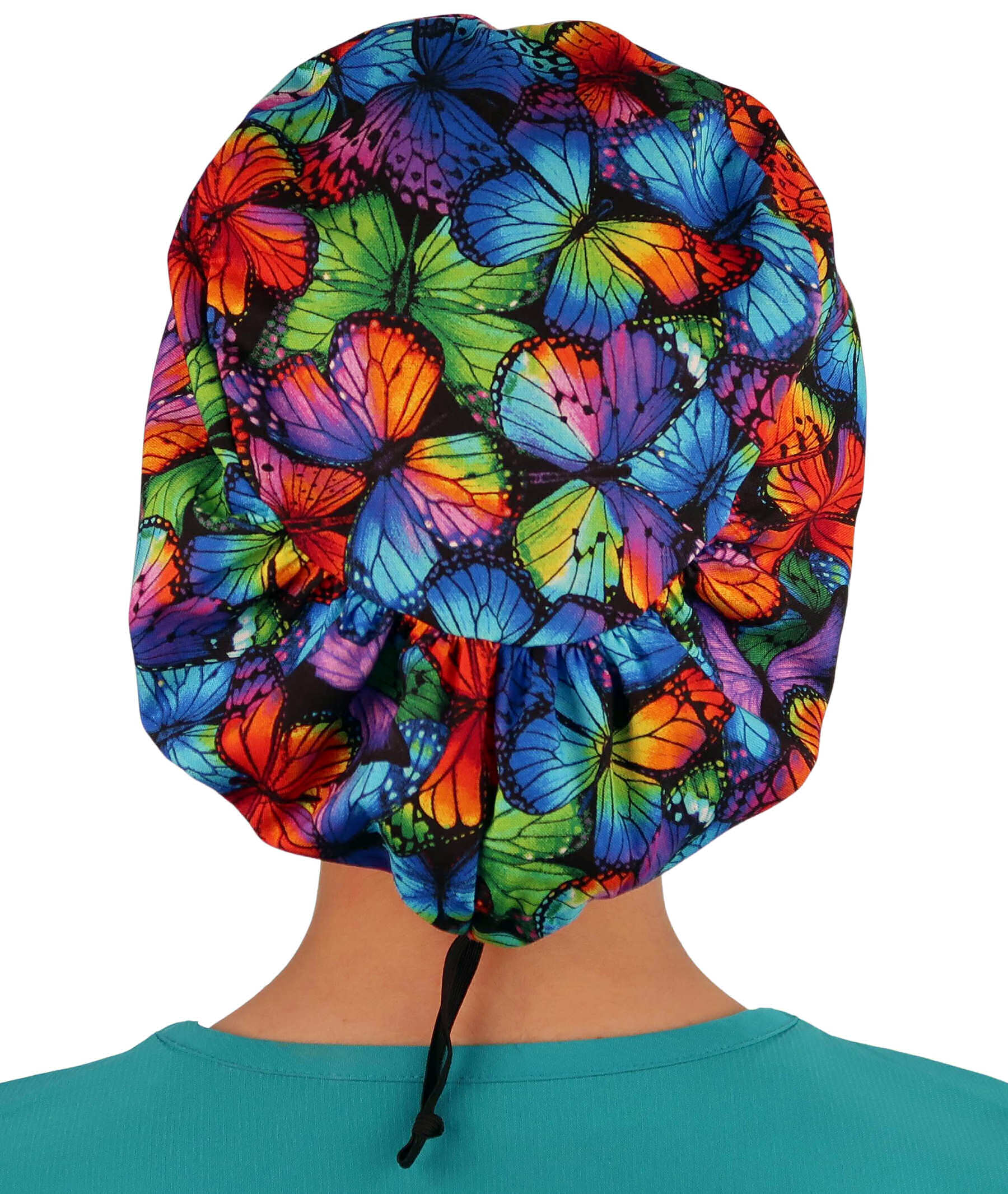Back facing image of a woman in scrubs wearing a Butterfly Me Away Euro Style Riley Comfort Scrub Cap.