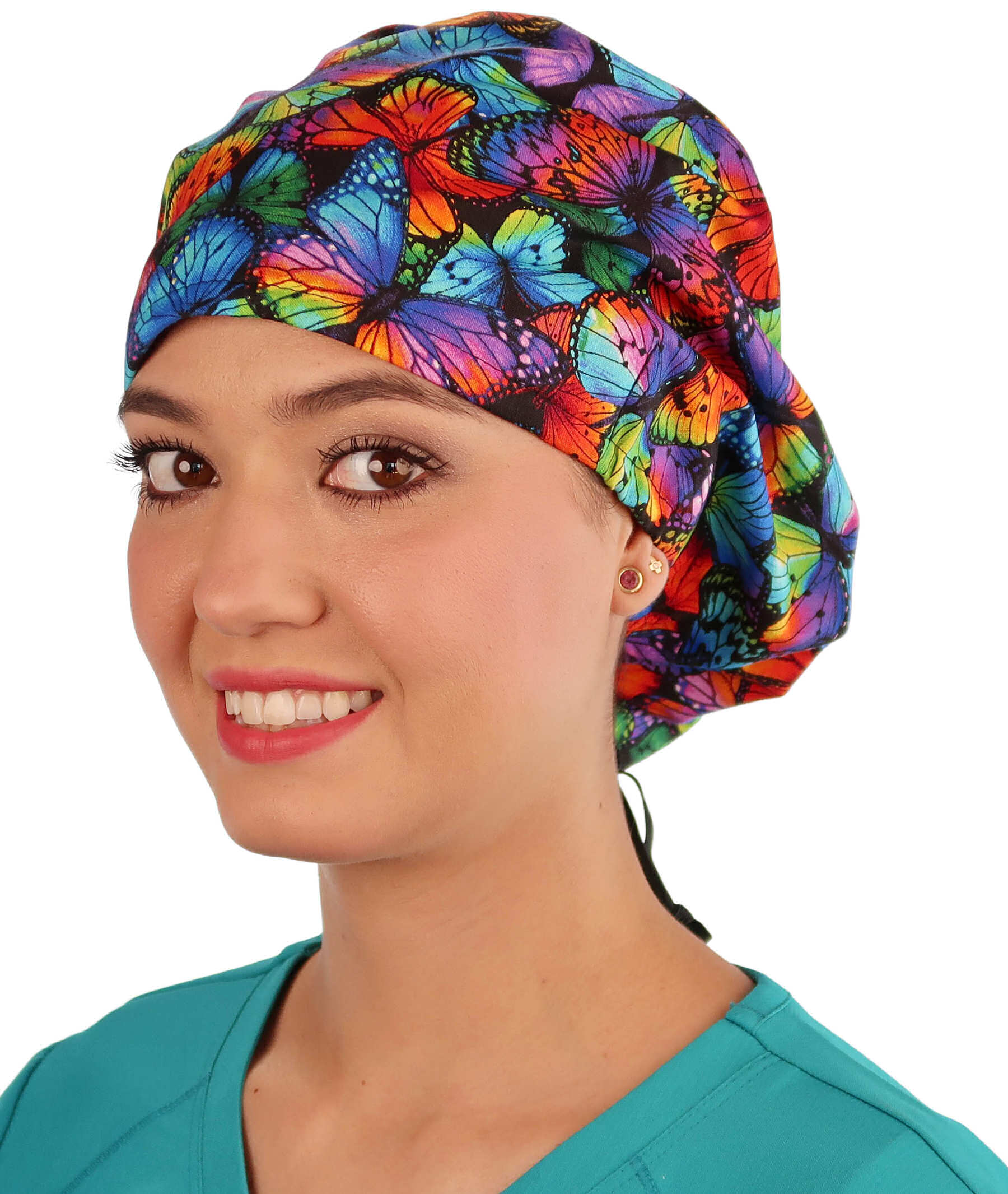 Front facing image of a woman in scrubs wearing a Butterfly Me Away Euro Style Riley Comfort Scrub Cap.