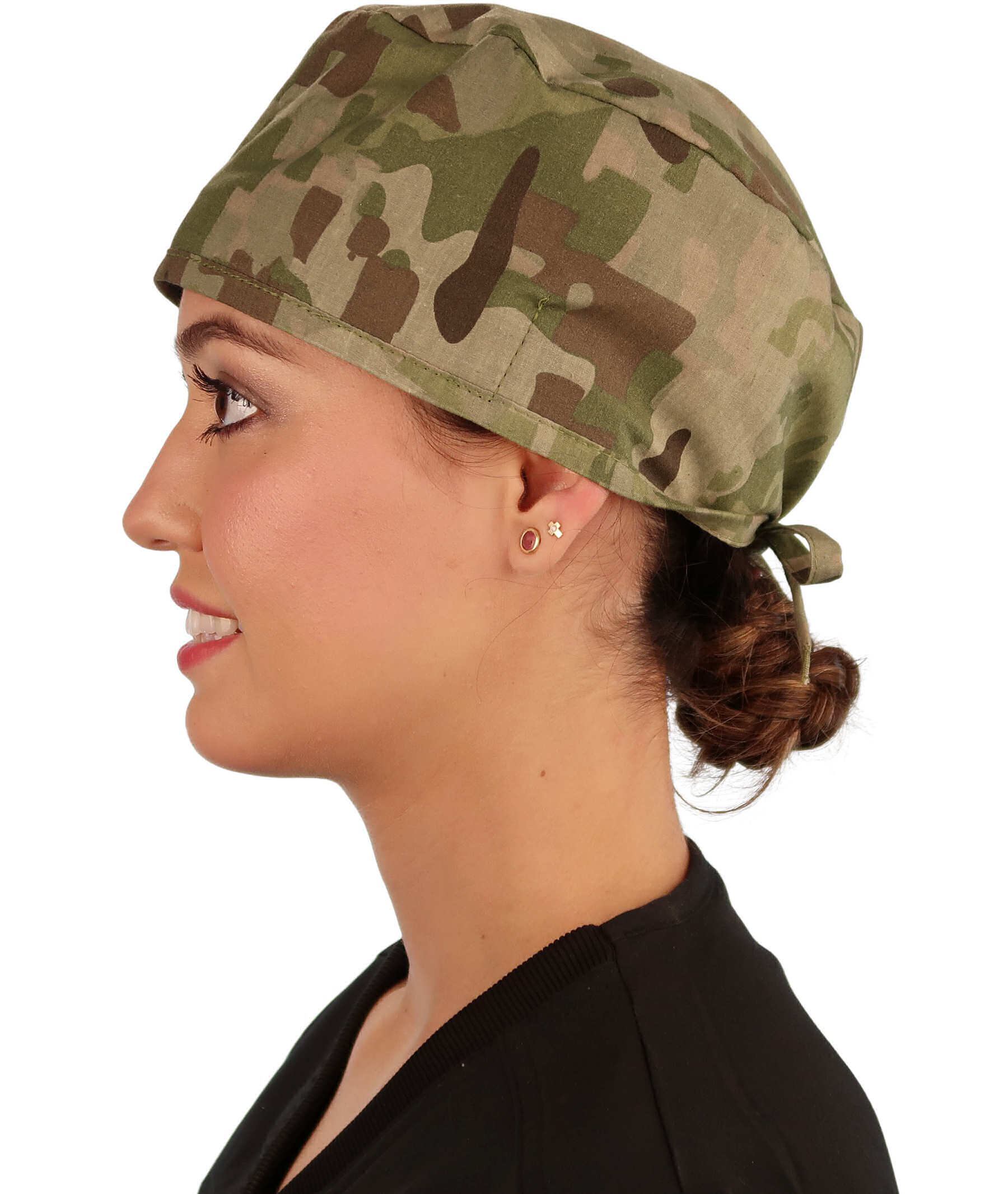 Side facing image of a woman in scrubs wearing a Classic Surgical Scrub Cap in Multi Camo pattern.