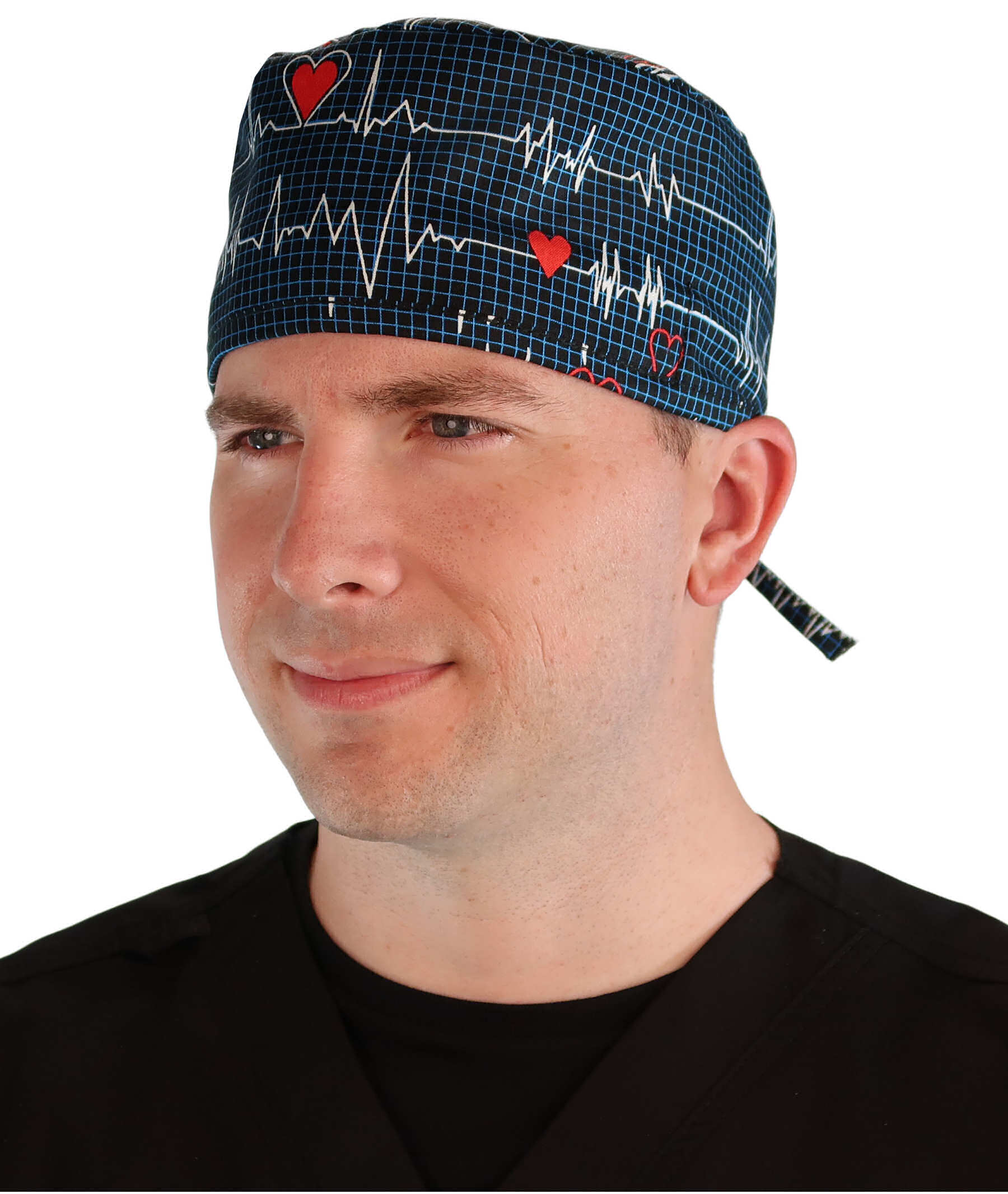 Front facing image of a man in scrubs wearing a Classic Surgical Scrub Cap in a Heartbeats on Navy pattern.