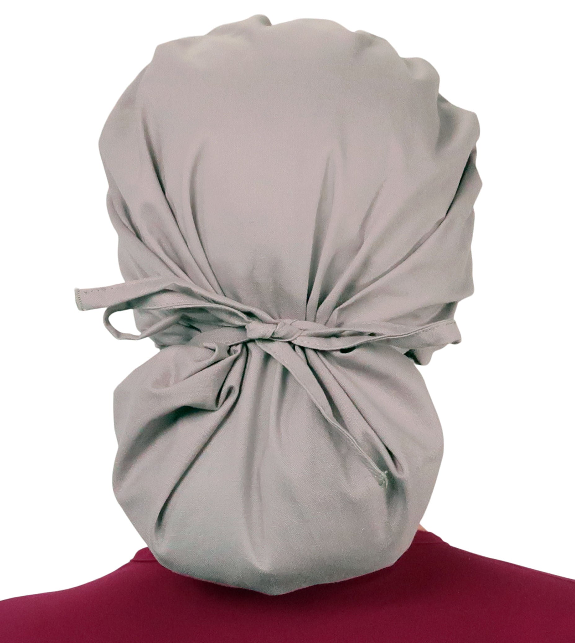 Back Facing Tied View of a Woman Wearing a Tied Back Banded Bouffant Ponytail Surgical Scrub Cap - Solid Light Grey Fabric