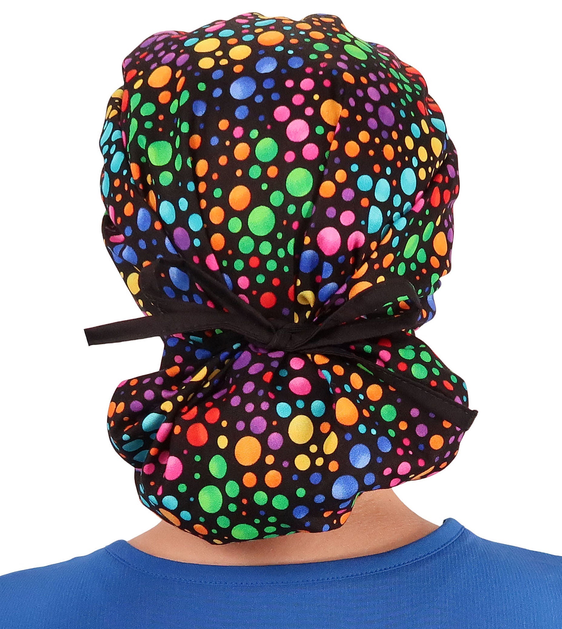 Back Facing Tied View of a Woman Wearing a Tied Back Banded Bouffant Ponytail Surgical Scrub Cap - Multi Color Dots Patterned Fabric  with Black Ties 