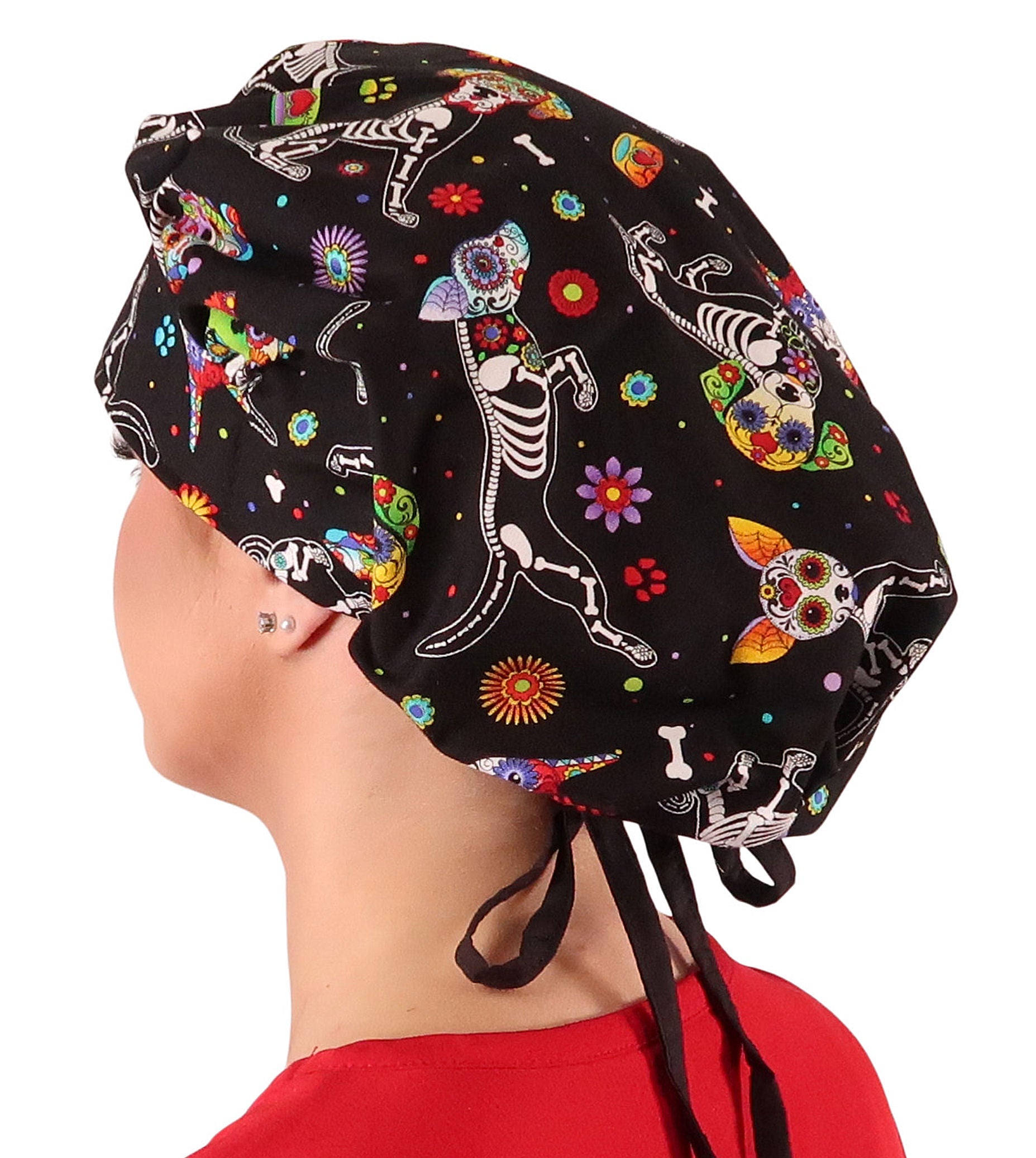 Side Facing Untied View of a Woman Wearing a Tied Back Banded Bouffant Ponytail Surgical Scrub Cap - X - Ray Dogs Patterned Fabric with Black Ties 