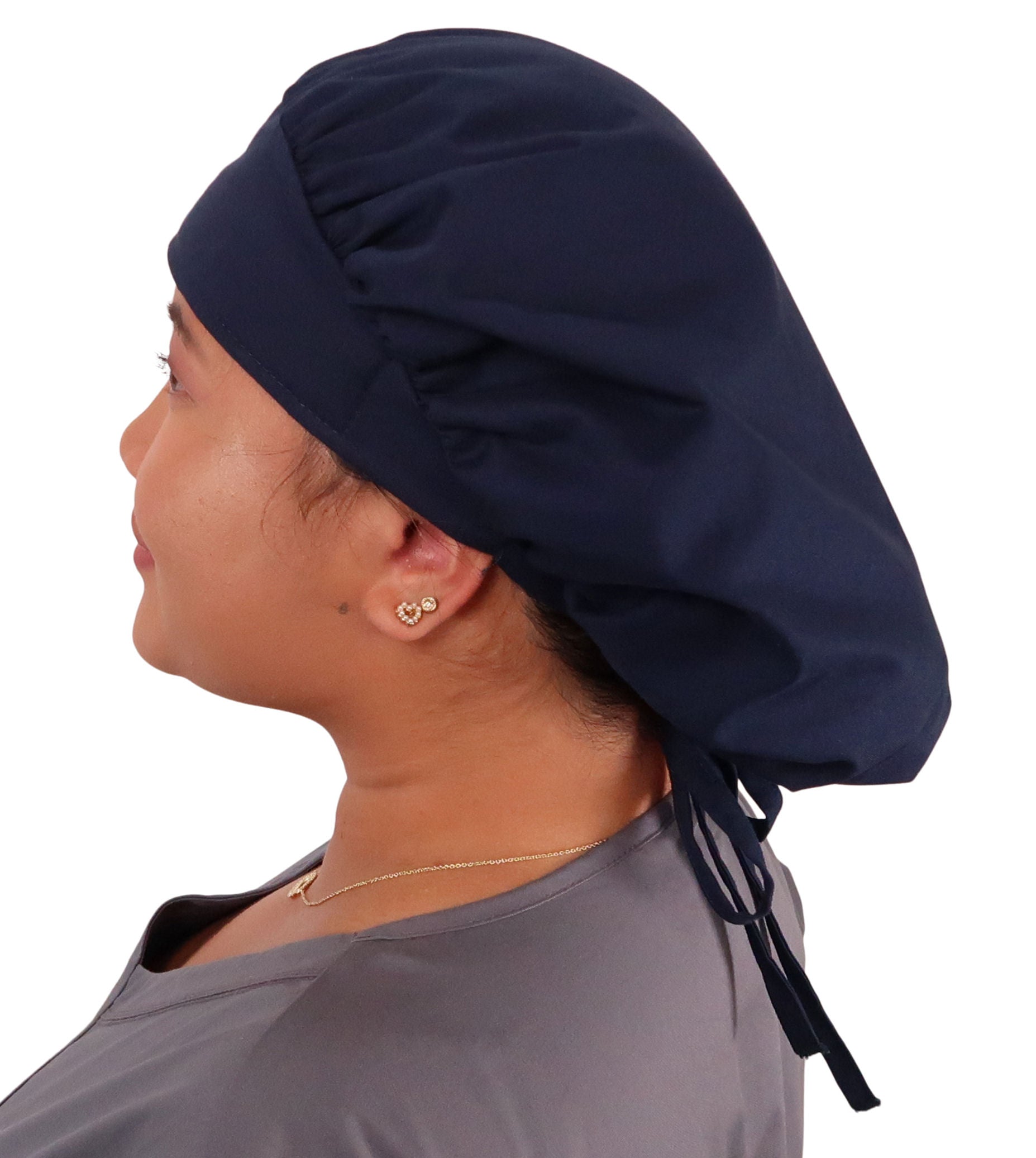 Side Facing Untied View of a Woman Wearing a Tied Back Banded Bouffant Ponytail Surgical Scrub Cap - Solid Navy Fabric