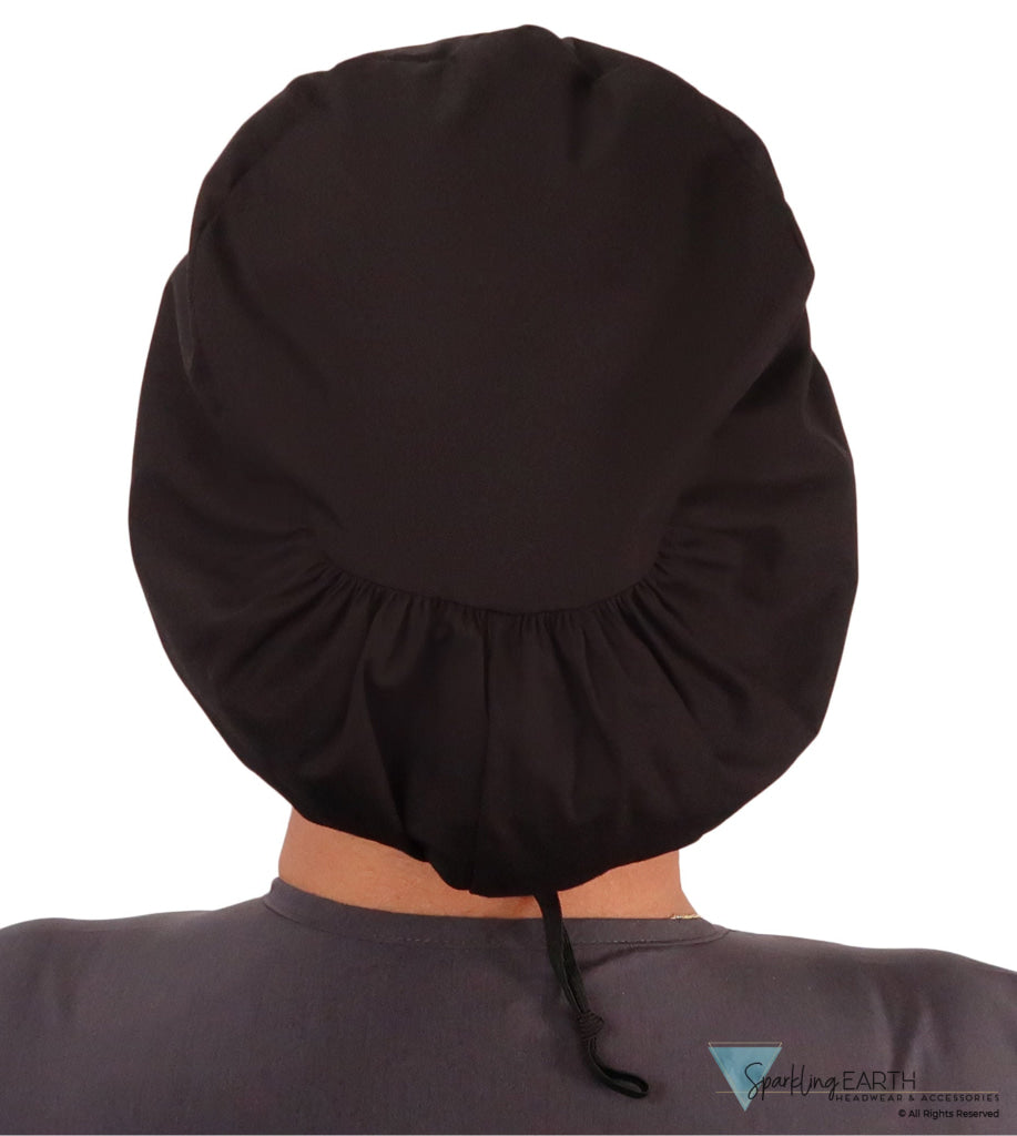 Back facing image of a woman in scrubs wearing a Black Euro Style Riley Comfort Scrub Cap.