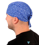 Surgical Scrub Cap - Snowflakes In Motion On Blue Caps